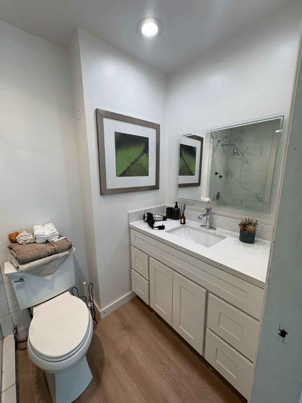 A bathroom with vanity and sink