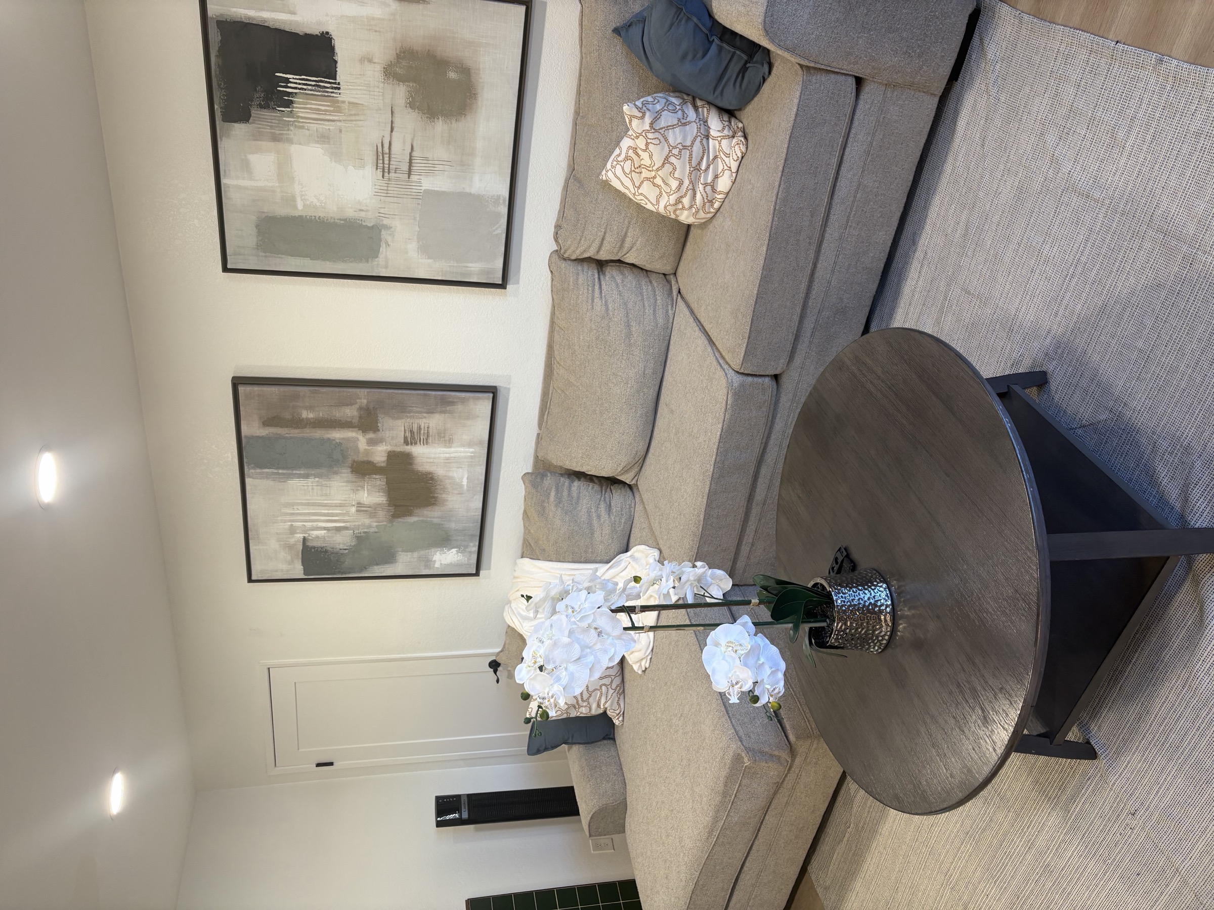The shared living room with a sectional couch